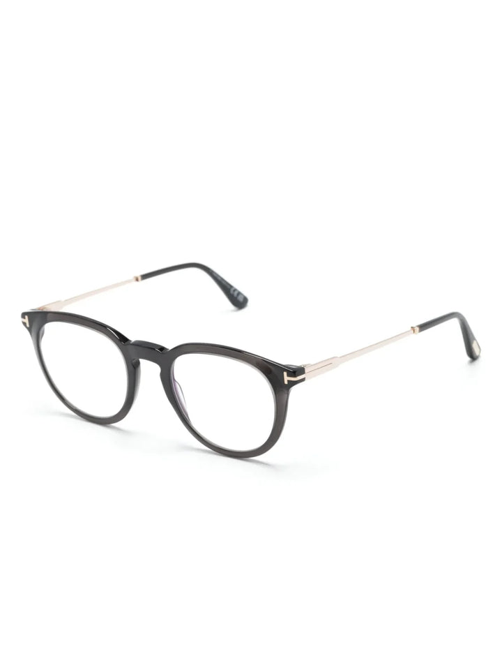 TOM FORD Eyewear logo-engraved round-frame glasses - Tenue